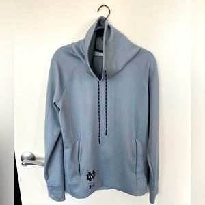 Under Armour cowl neck sweatshirt with Notre Dame decal. Size medium.